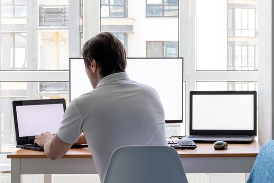 Tenacious marketer working on a computer